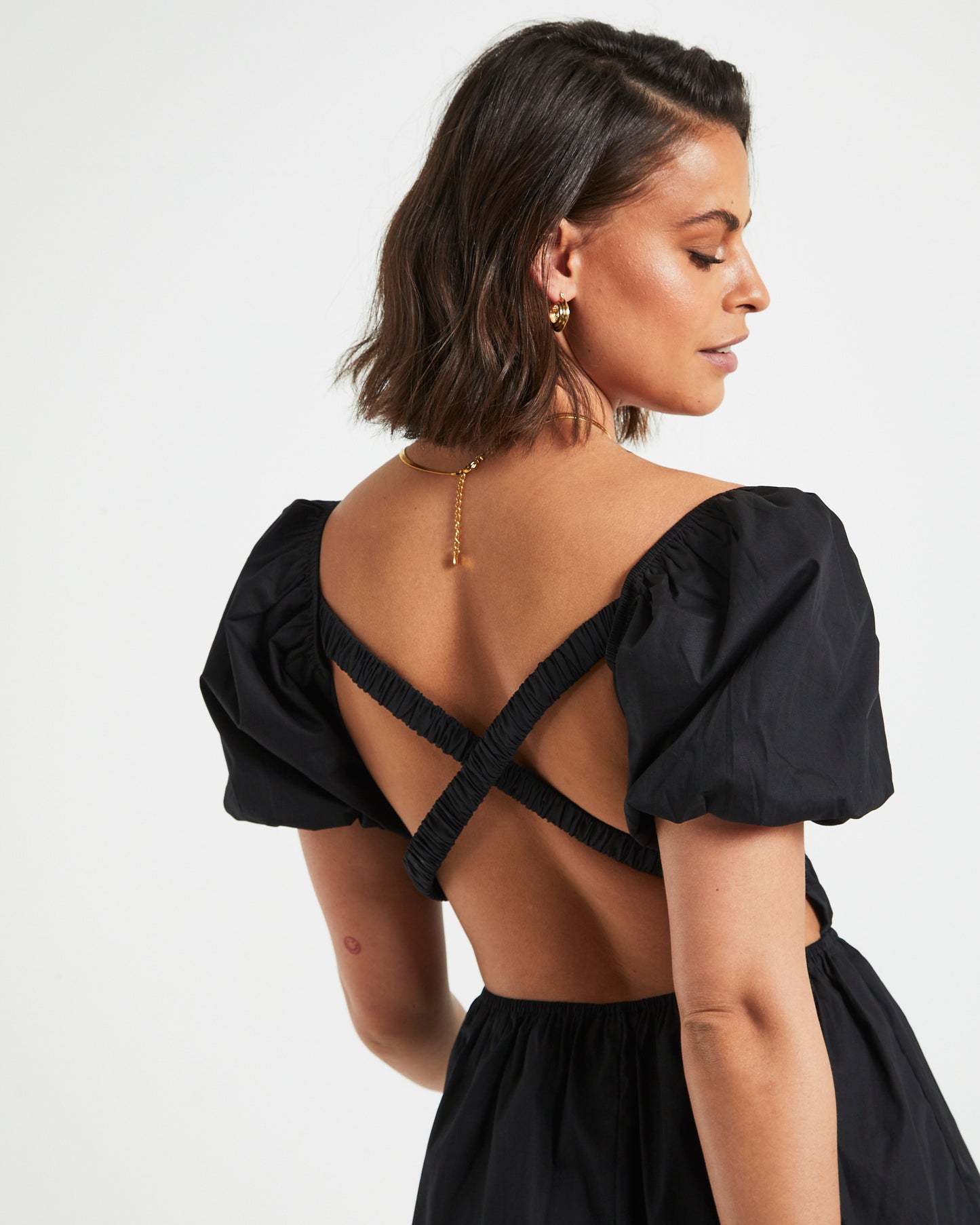 Rylee Backless Puff Sleeve Mini Dress in Black General Pants Co. Rylee Backless Puff Sleeve Mini Dress in Black General Pants Co.
