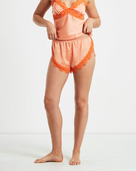 Exie Cheeky Runner Silky Shorts in Peach